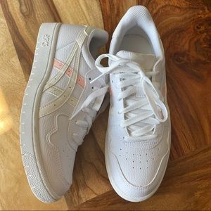 ASICS 1192A147 tennis shoes white with pink accents. worn a few times inside